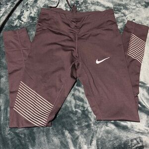 Nike Women's Black Leggings with Stripe Accents